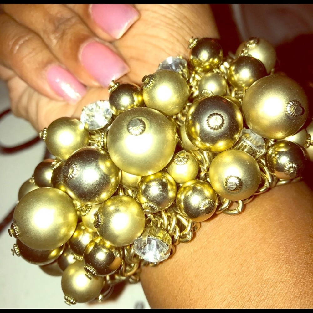 Gold chunky bracelet with accent balls